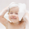 baby enjoying foam bath